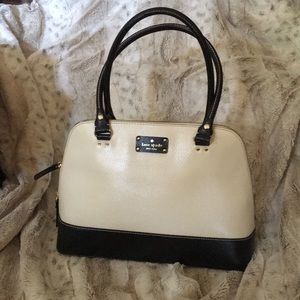 Cream and Black Kate Spade arm bag. Never used.